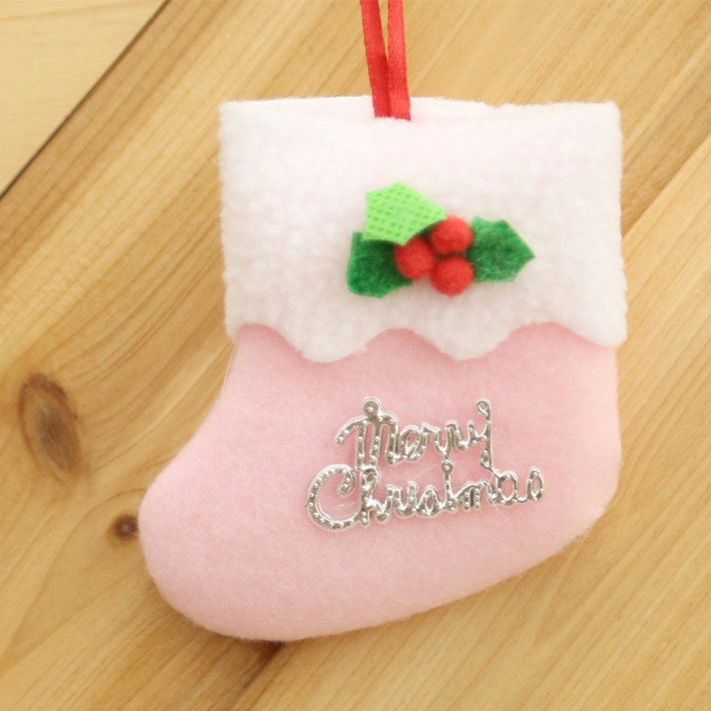 Cloth Christmas stocking ornament measuring 3.1 by 3.1 inches