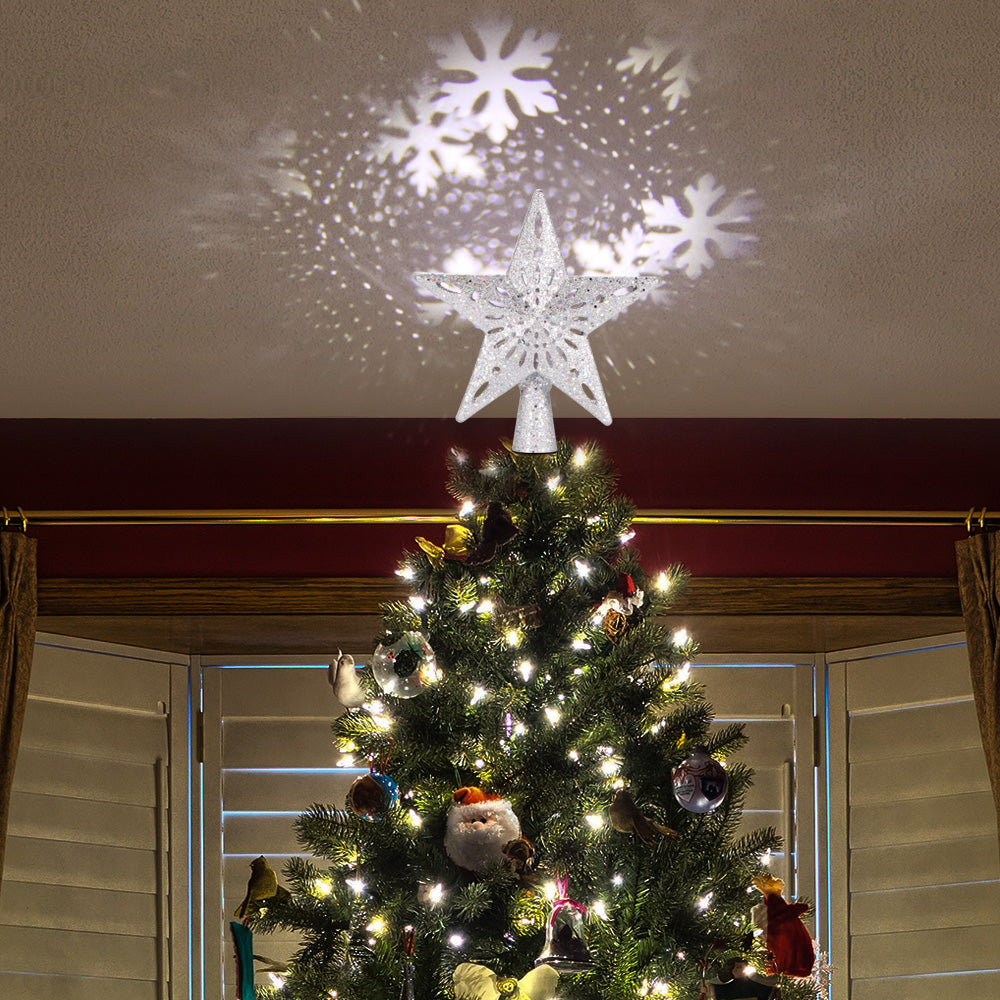 Star tree topper with an adjustable projector head that turns to aim the pattern