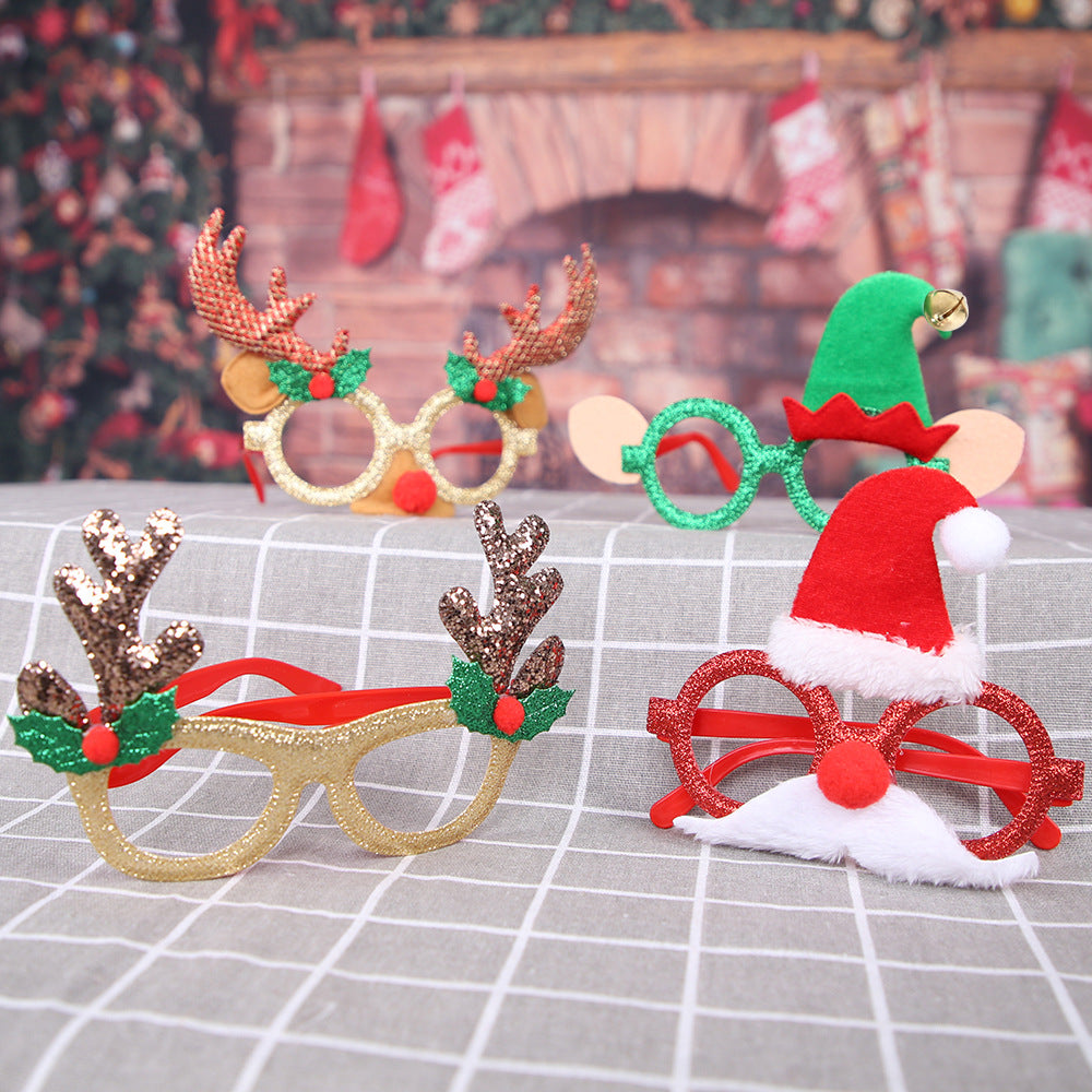 Novelty Christmas party glasses with a gold frame and long red antlers