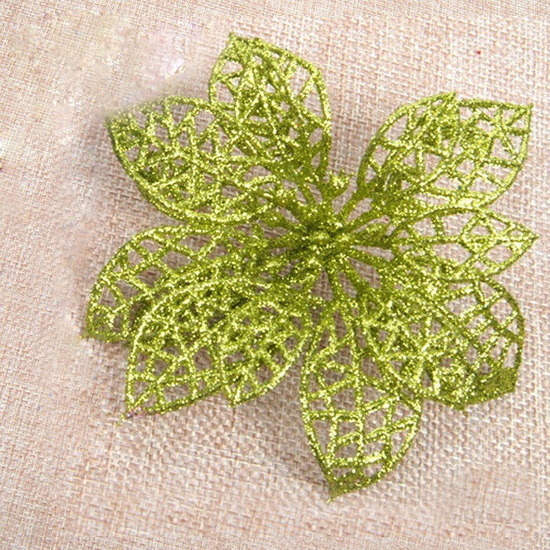 Green glitter Christmas flower with a light-catching glitter finish