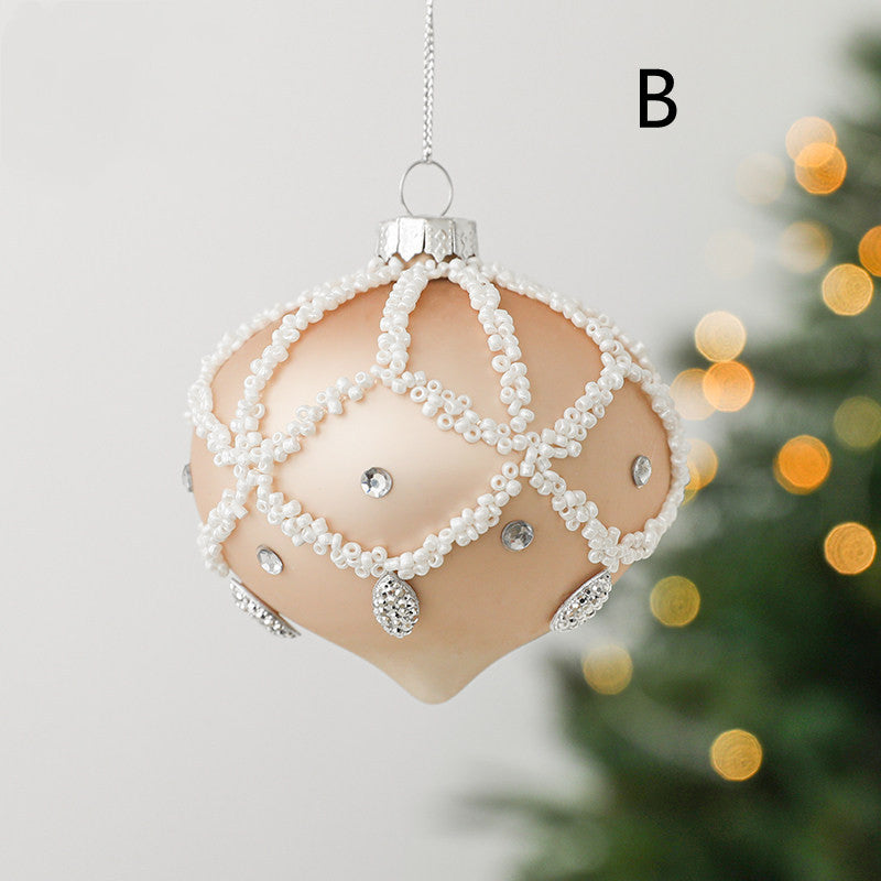Champagne glass Christmas ornament with a diced ribbed pattern
