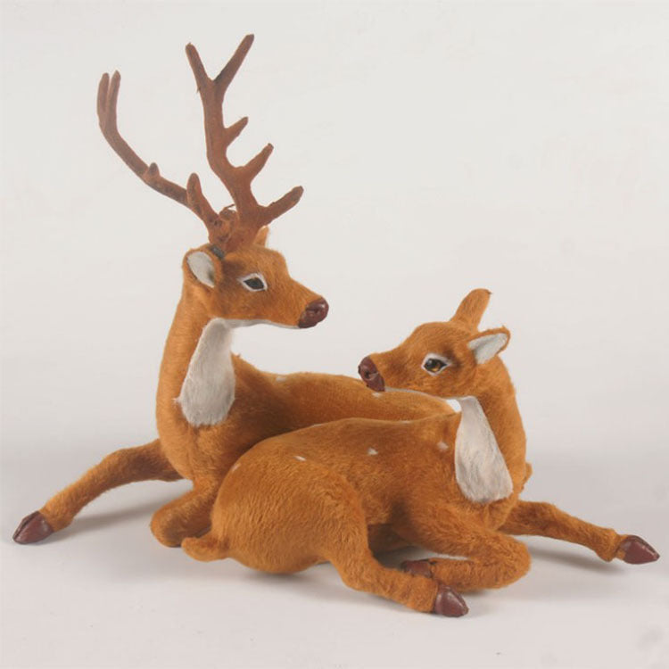 Flocked Christmas reindeer figurines in the 5.9, 7.9 and 11.8 inch heights