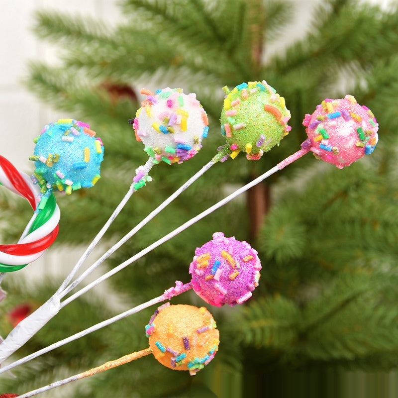 Pastel Christmas twig arrangement built on a wrought iron frame