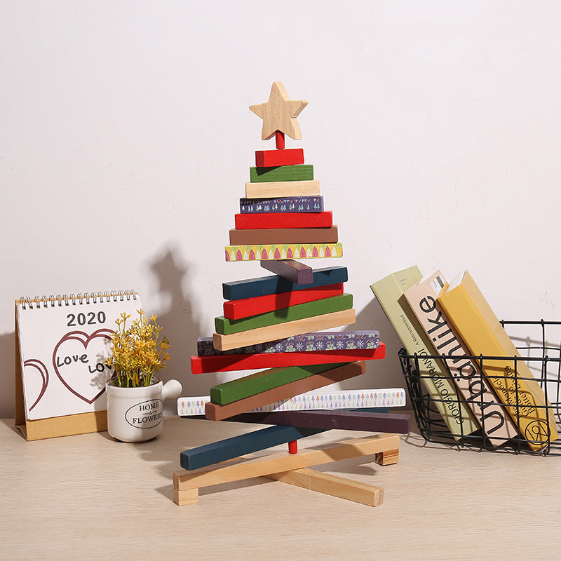 Pared back modern Christmas tree form in carved painted wood