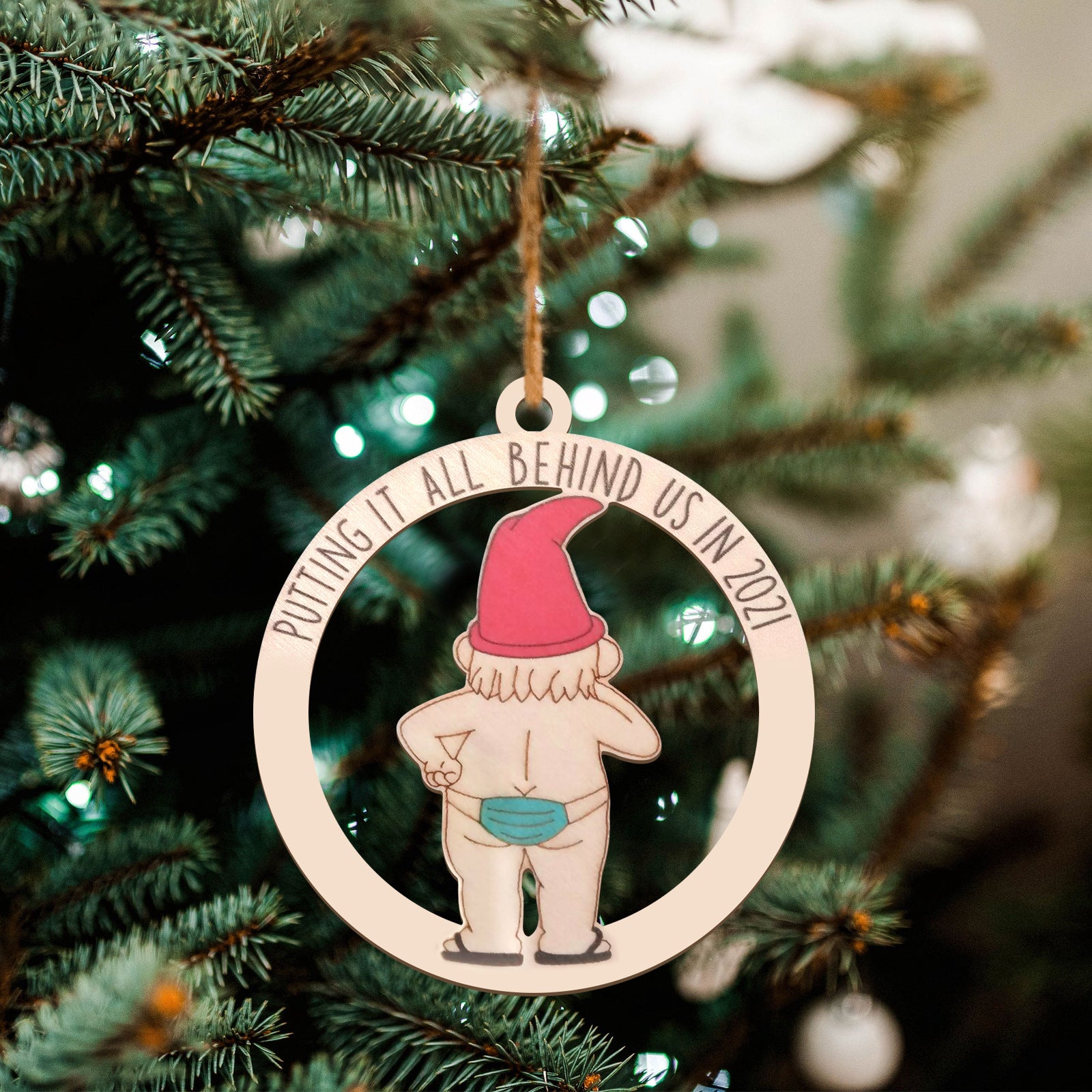 Wooden Christmas tree ornament cut in a tree silhouette with hanging cord