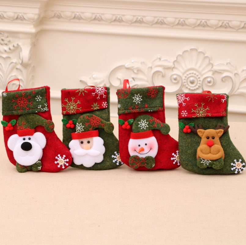 Four flannel stocking designs: Santa, snowman, deer and bear