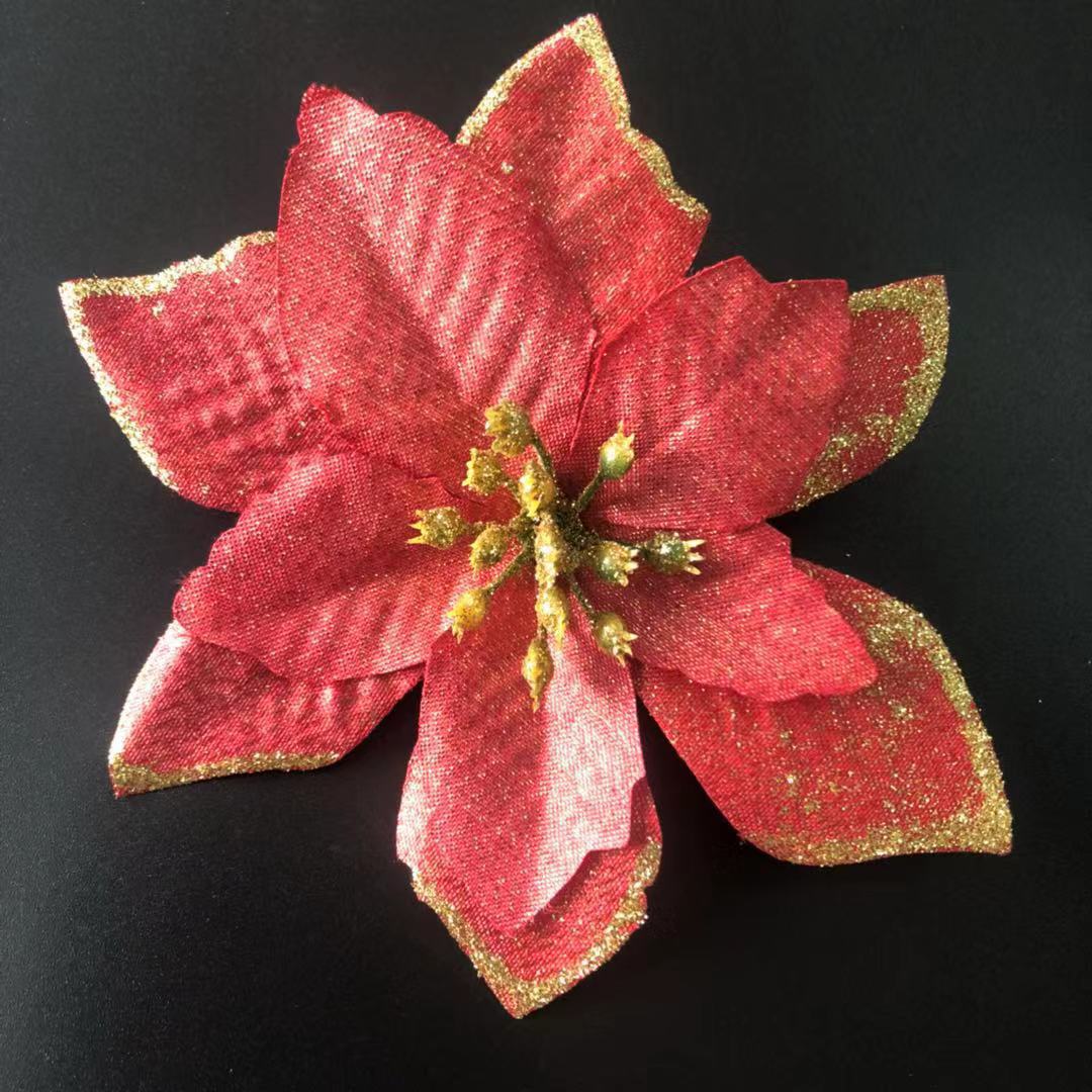 Christmas flower pick with a stem shaped to tuck between tree branches