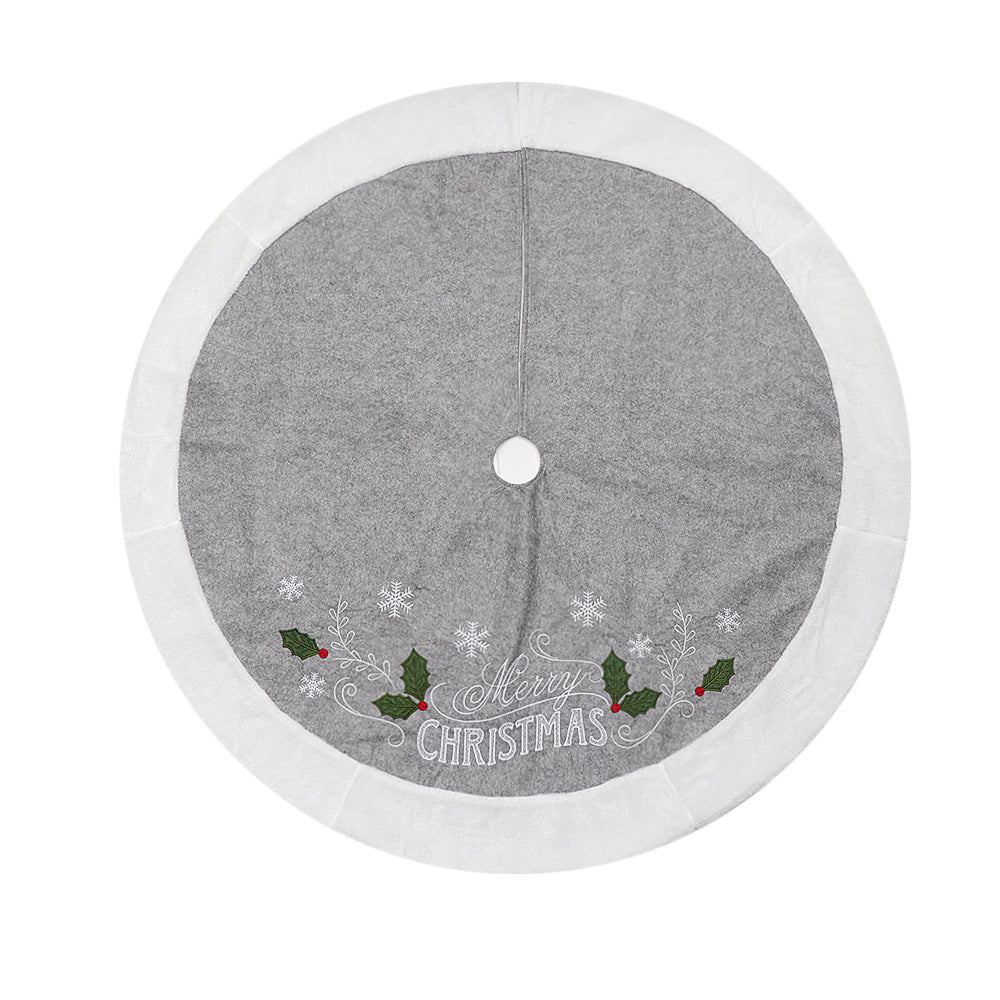 Leaf design printed across the face of the gray tree skirt