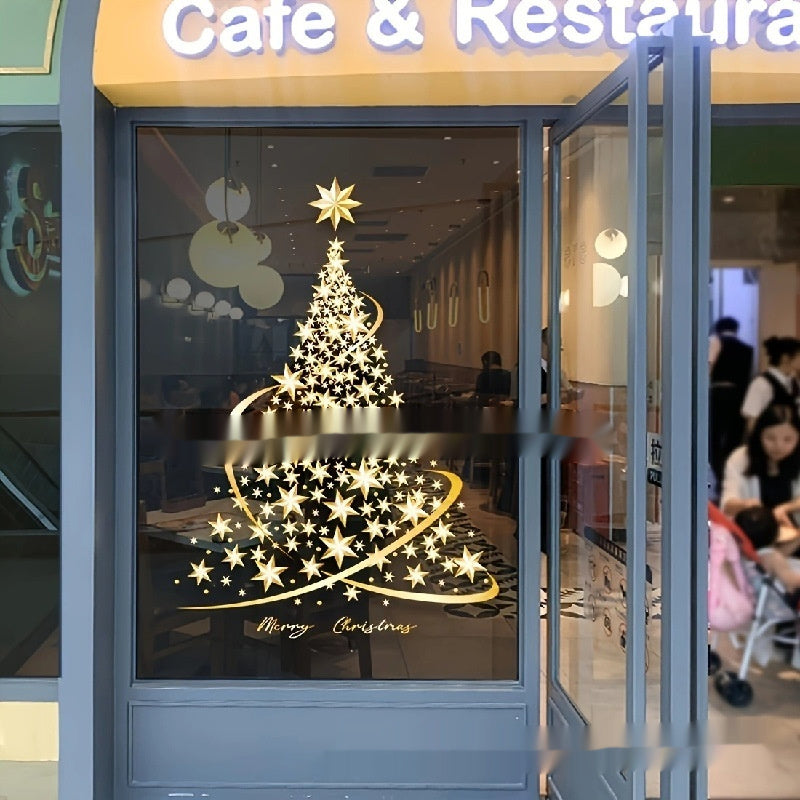 Christmas tree decal drawn from gold snowflake and star shapes