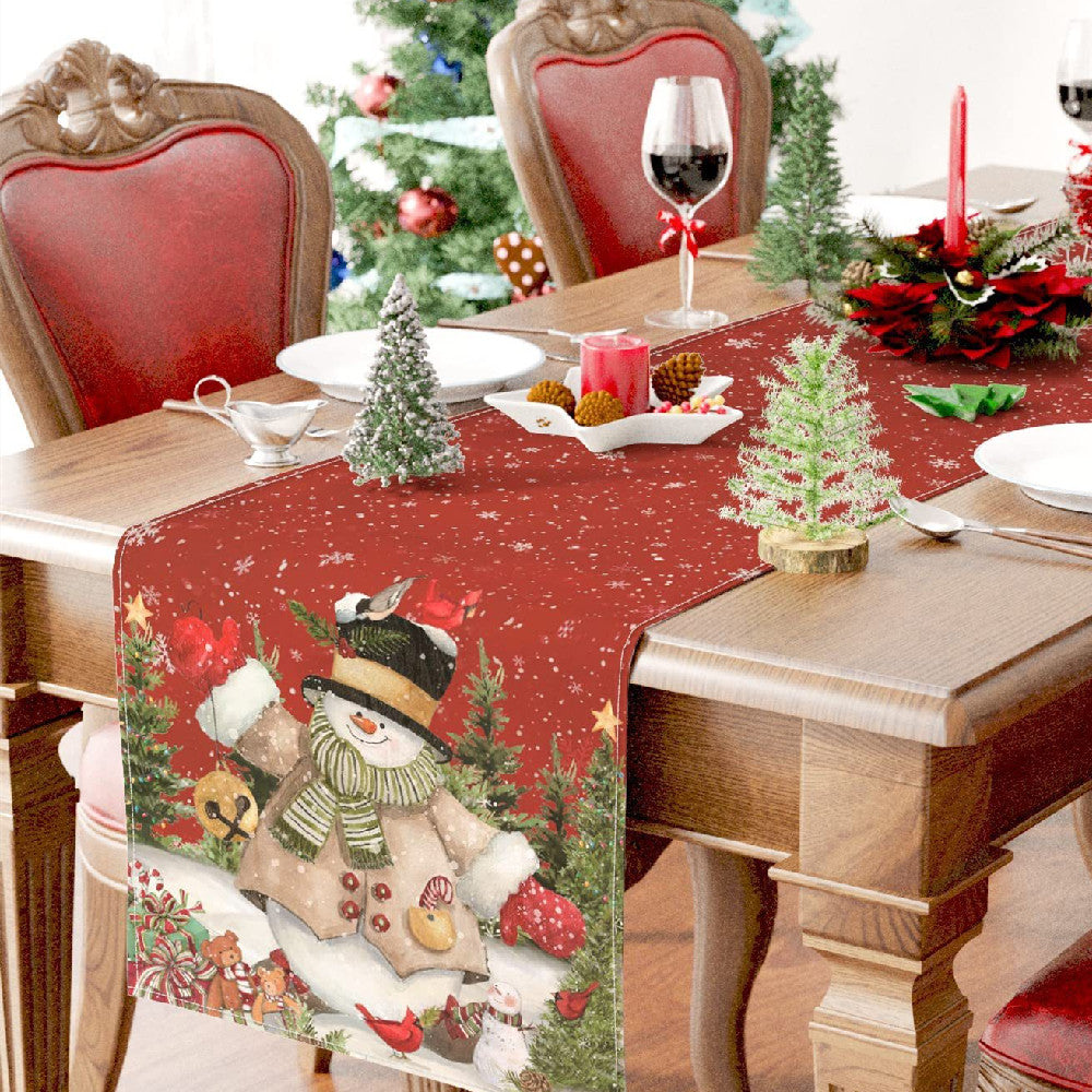 Snowman print across the linen style woven surface of the runner