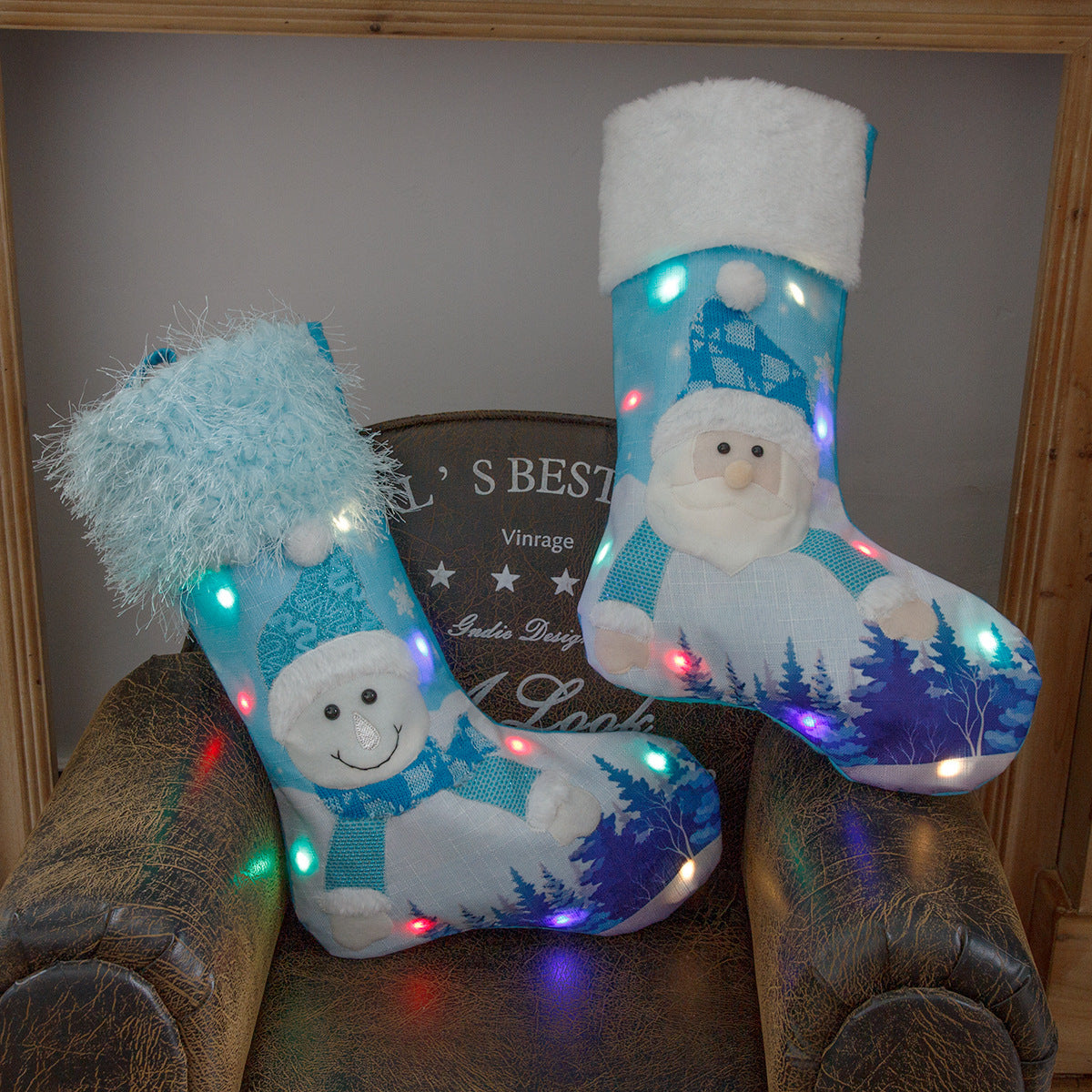 Large blue plush Christmas stocking printed with a Santa design