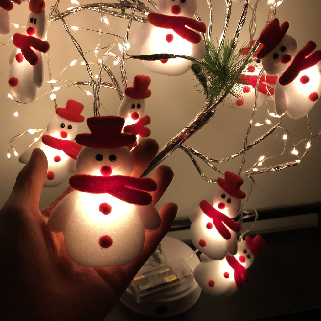 9.8 foot plush Christmas light string carrying twenty warm white LEDs