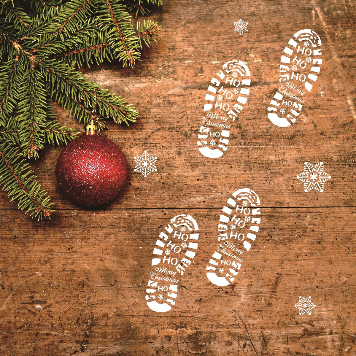 Boot shaped Christmas stencil template cut from rigid white plastic