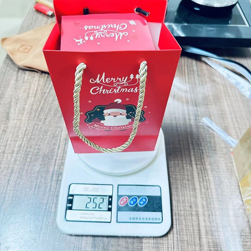 Twenty paper Christmas bounce boxes from the largest set size