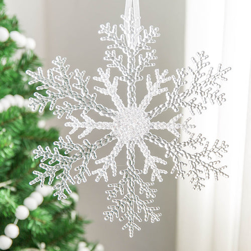 Acrylic snowflake pendant drilled with two holes for hanging flat
