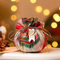 Red fabric Christmas gift pouch sized for jewelry or a gift card