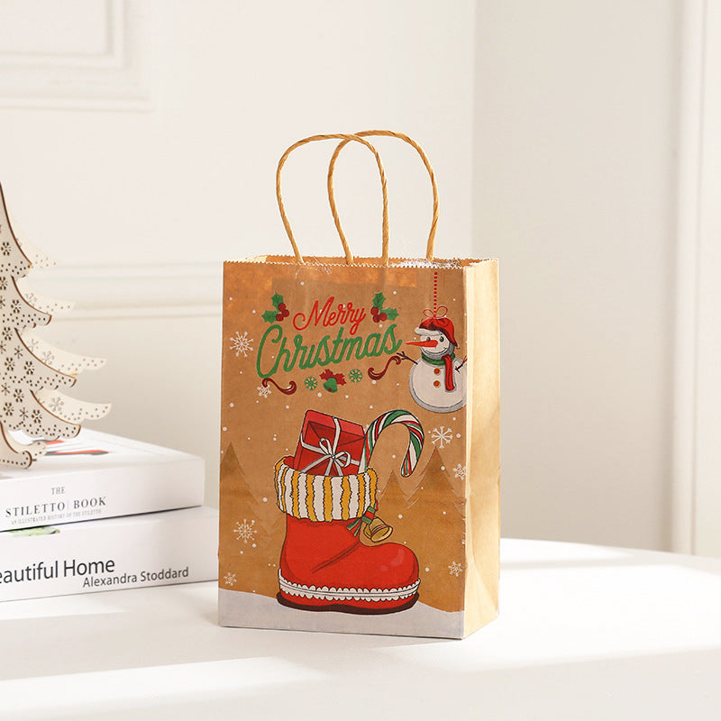 Four printed Christmas designs offered across the gift bag range