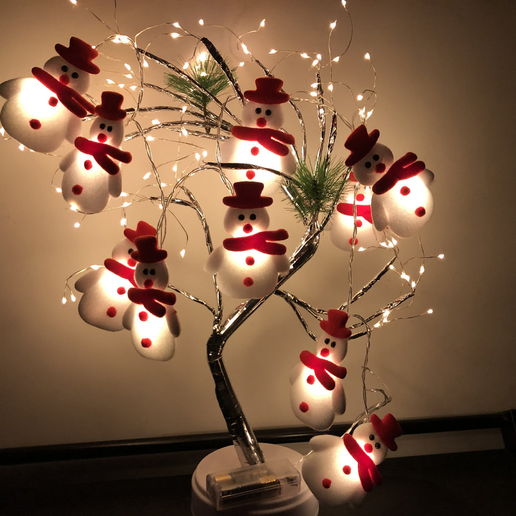 Santa figure plush Christmas string lights with soft warm white LEDs