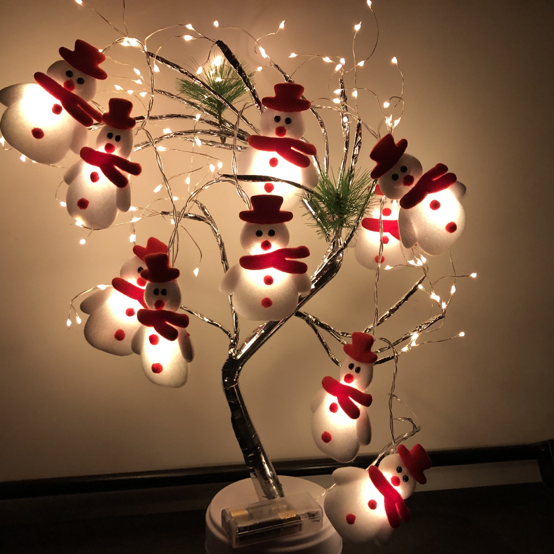 Santa figure plush Christmas string lights with soft warm white LEDs