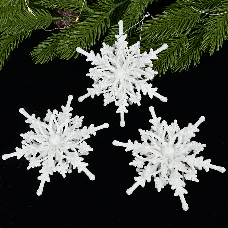Snowflake pendant with its arms cut out across the full span
