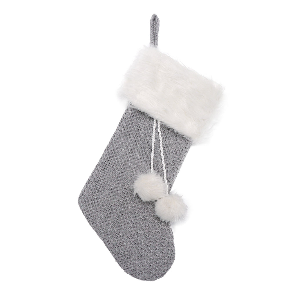 Christmas sock decoration sewn from cloth in gray and white