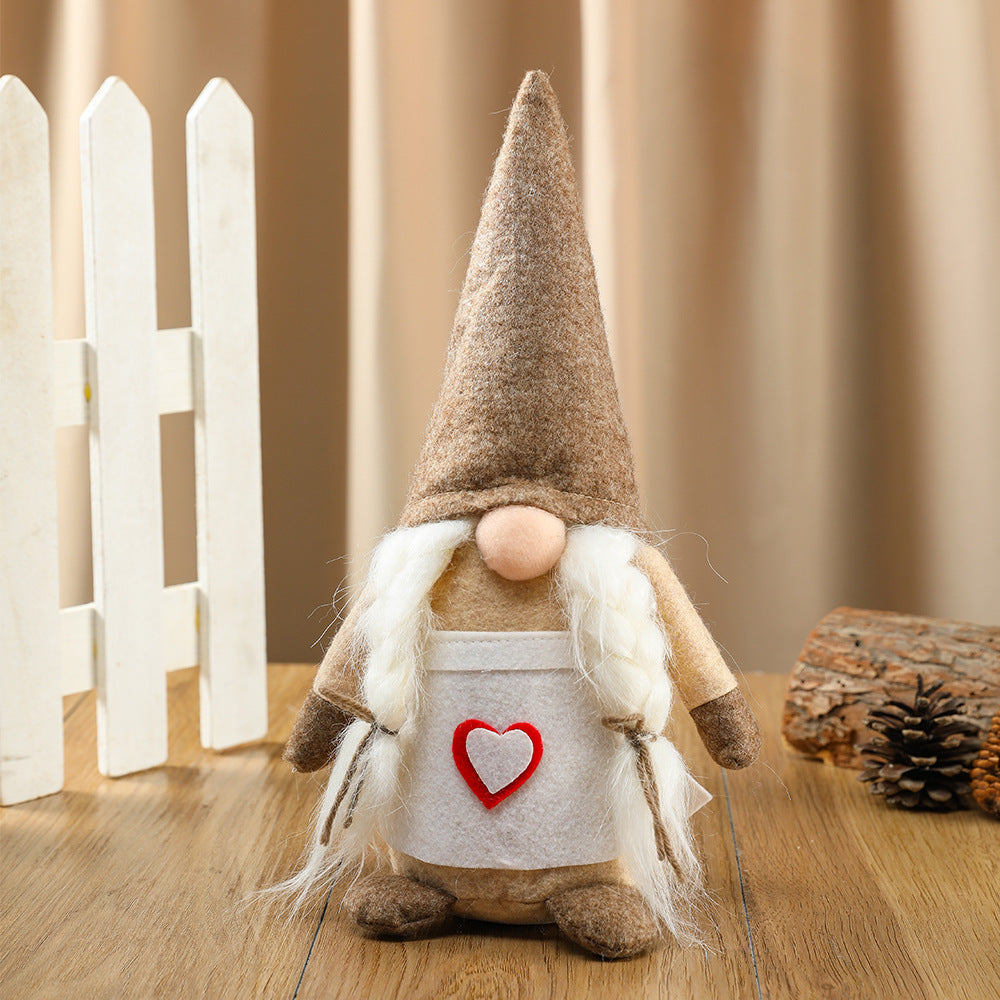 Standing faceless Christmas gnome doll made from soft cloth