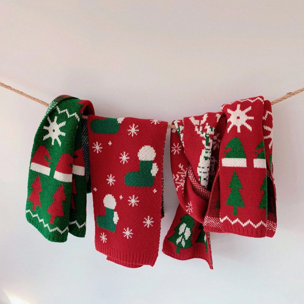 Christmas scarf embroidered with a pair of boots on knitted acrylic