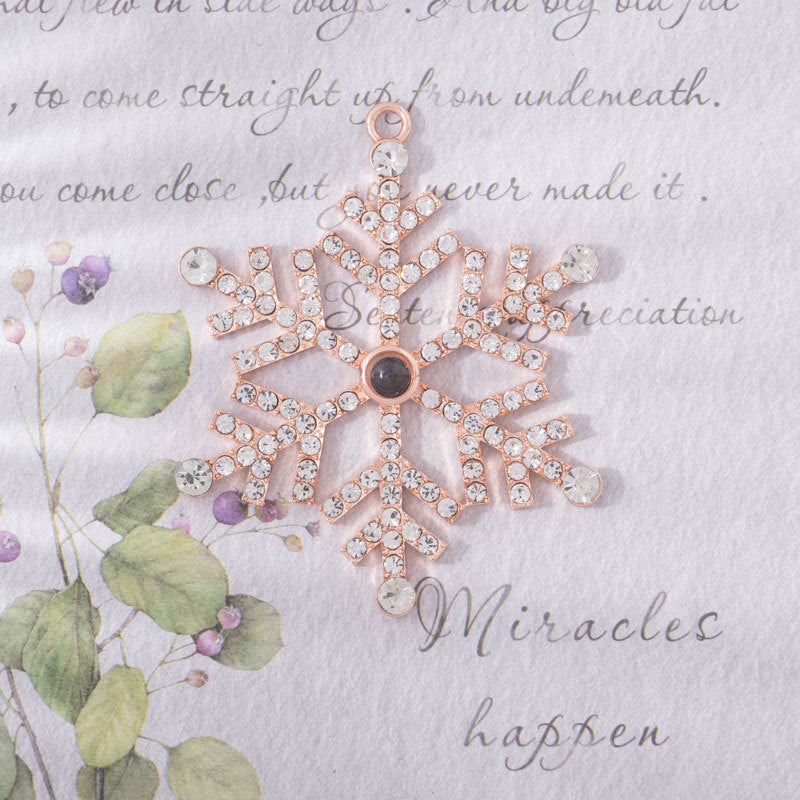 Blue plated finish on the alloy snowflake Christmas pendant