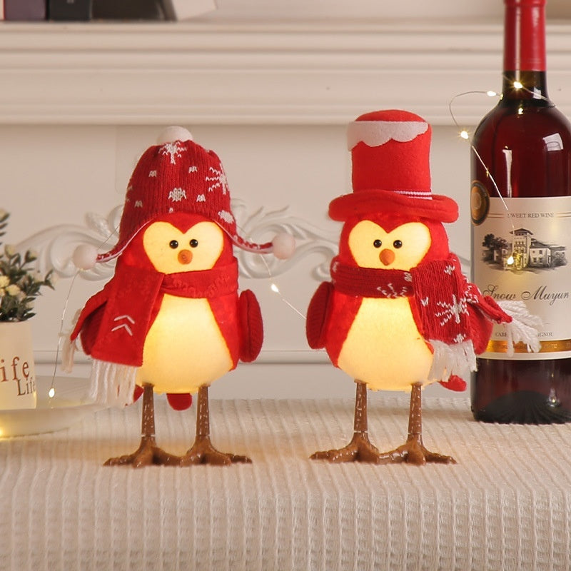 Bird figure in a red round cap from the six style range