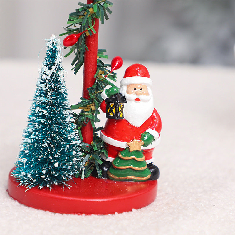 Reindeer, Santa and snowman resin Christmas candle holders together