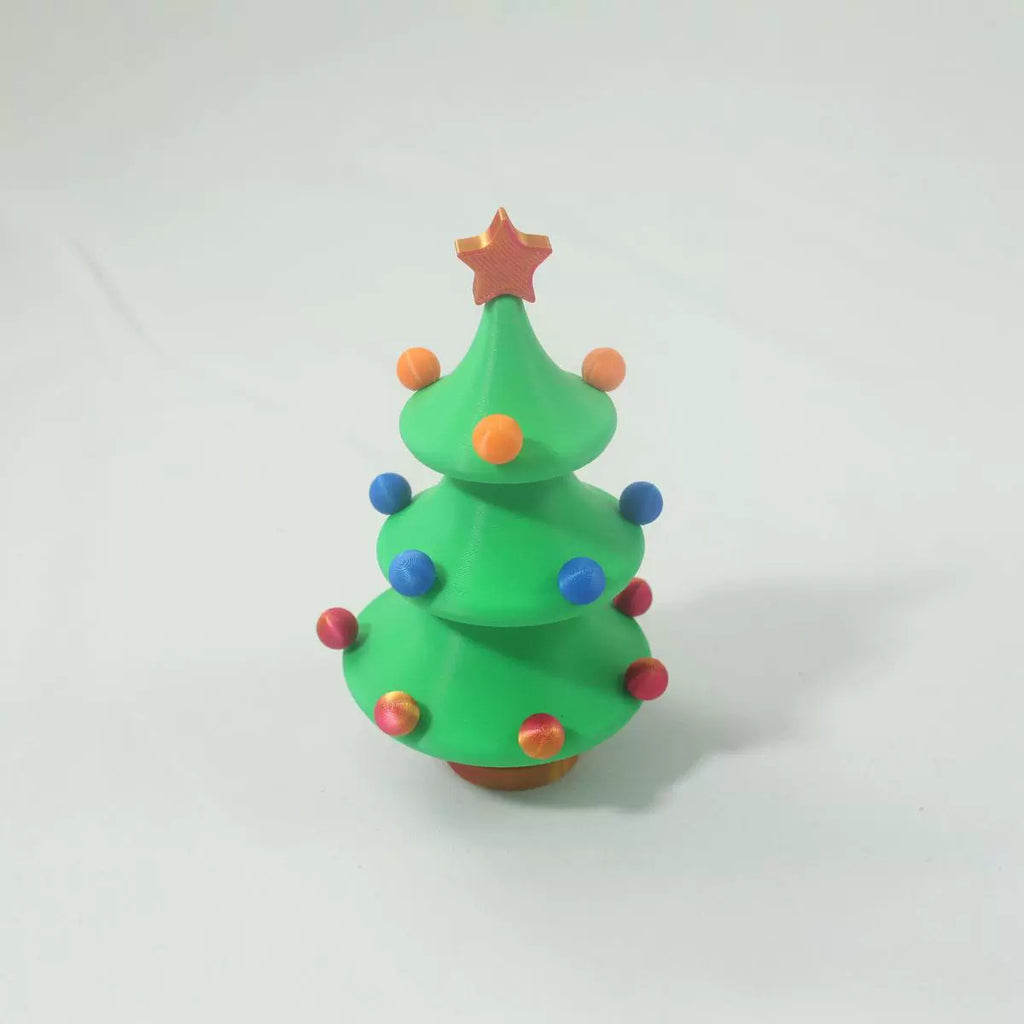 Green PLA Christmas tree toy measuring 3.5 by 3.5 by 5.9 inches