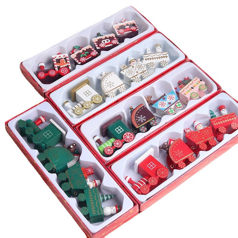 Green wooden Christmas train, one of five painted finishes