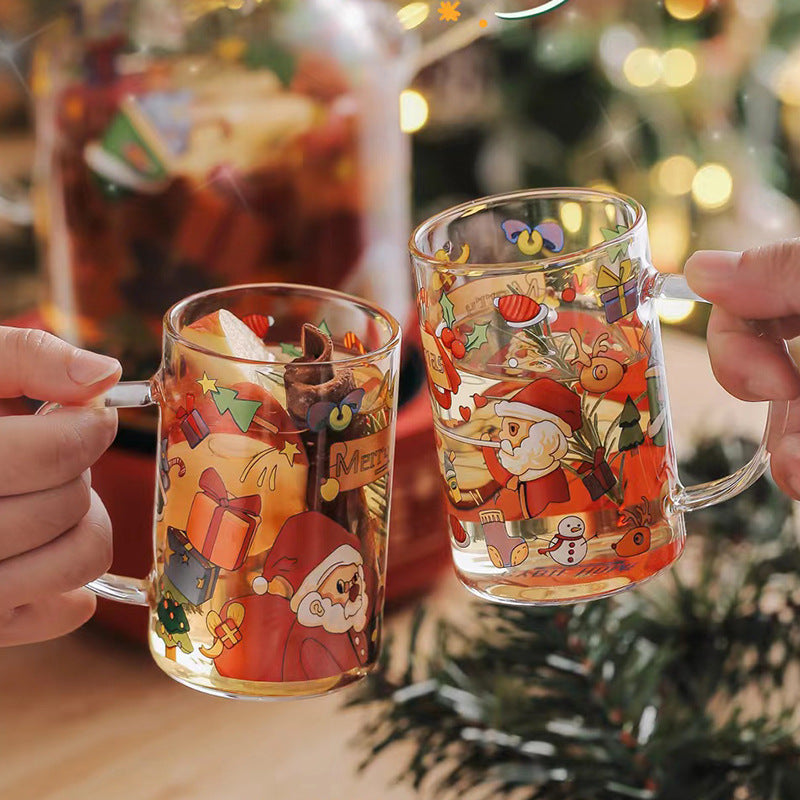 Christmas gift cup made of glass with a snowman figure
