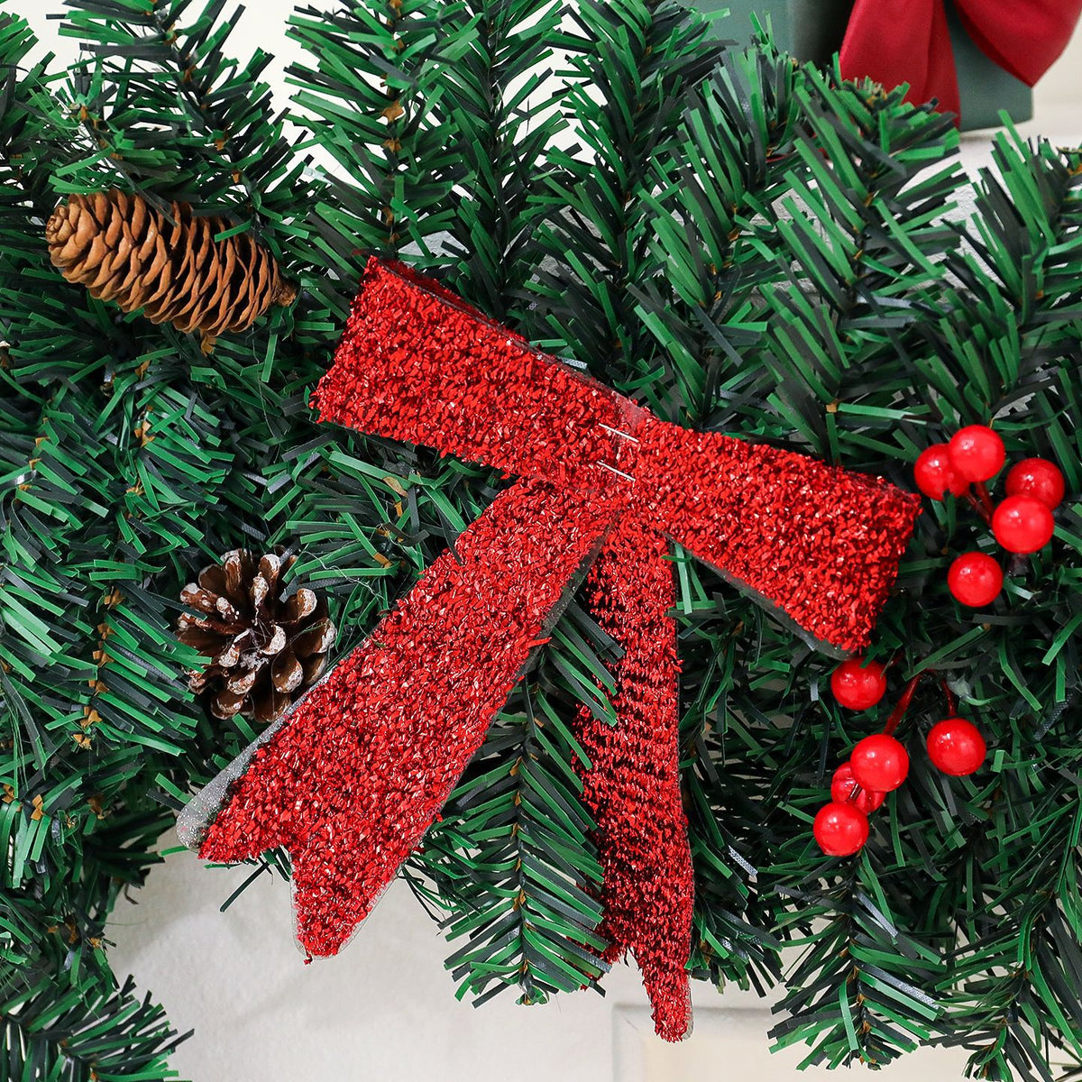 Colored light version of the same pine cone bow wreath