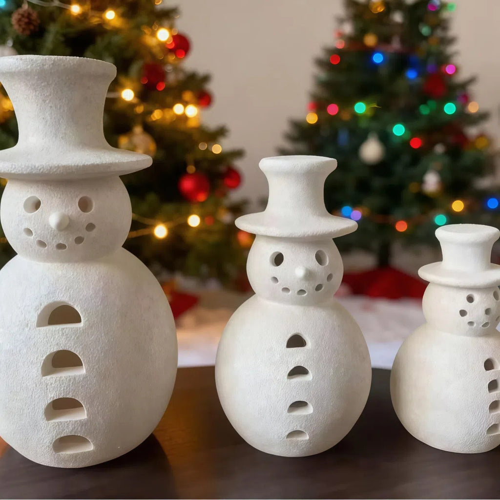 Medium snowman figurine standing 7.9 inches tall with painted hat and scarf