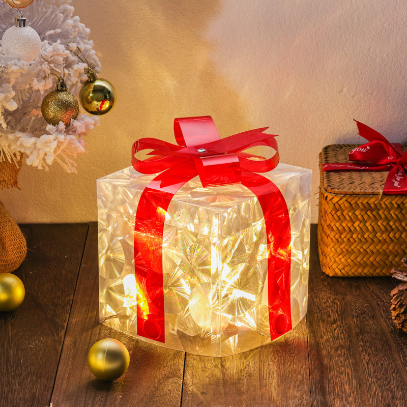 Glowing red Christmas gift box that needs no wrapping paper or ribbon