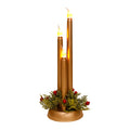 Three graduated plastic pillar candles mounted on a single round base