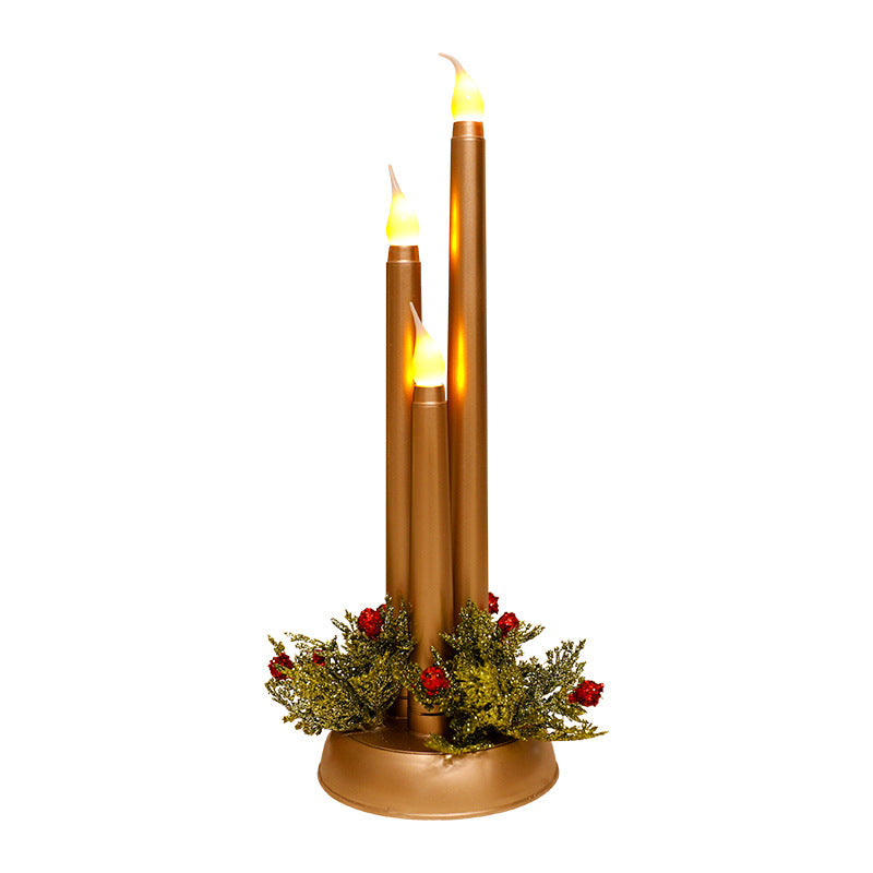 Three graduated plastic pillar candles mounted on a single round base