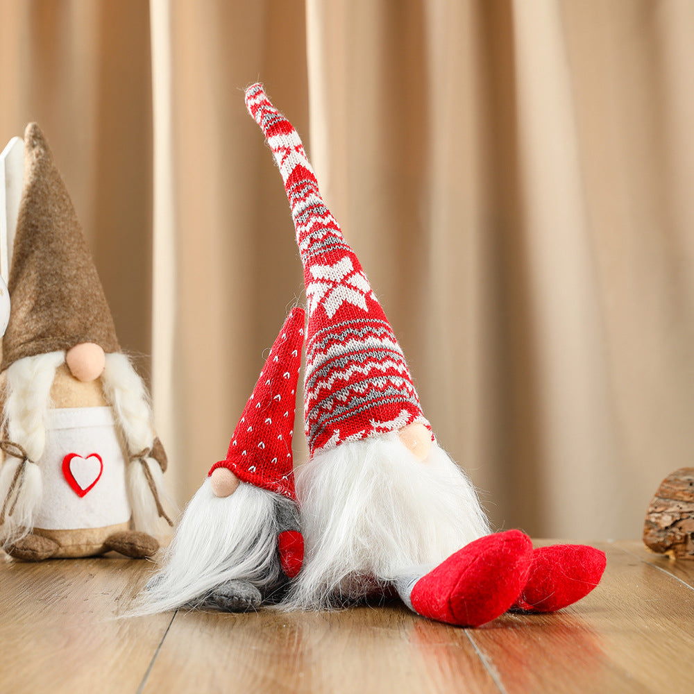 Faceless Christmas gnome with a long beard and pointed hat