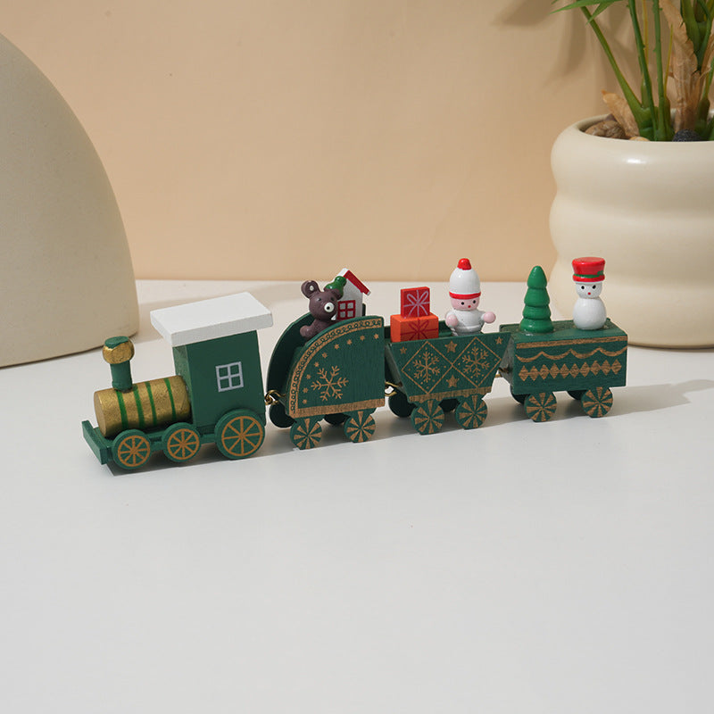 Carriage detail of a painted wooden Christmas train, sold singly