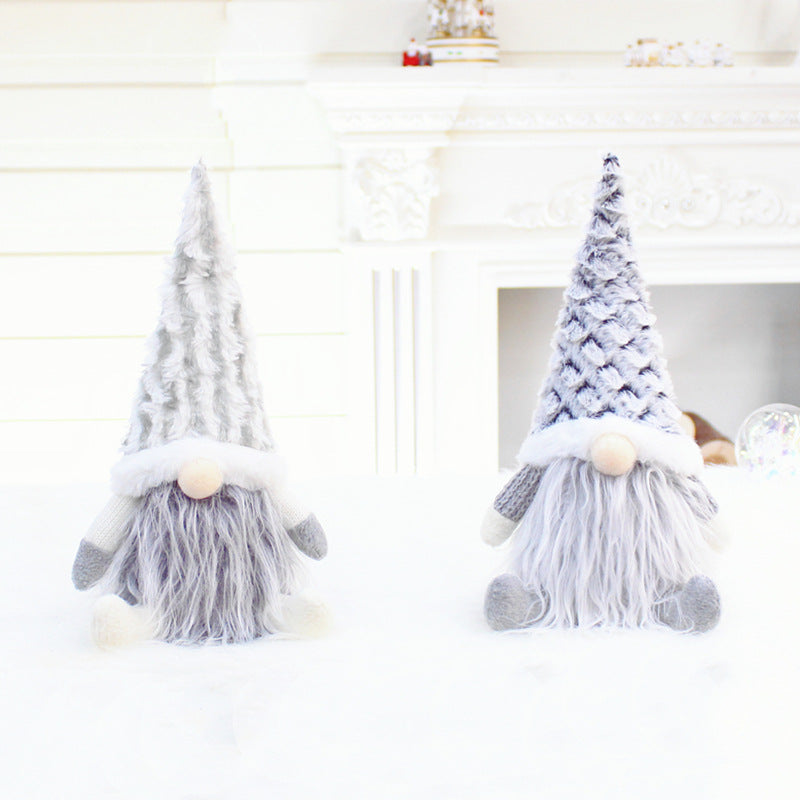 White gnome plush doll with a telescopic pole through the legs