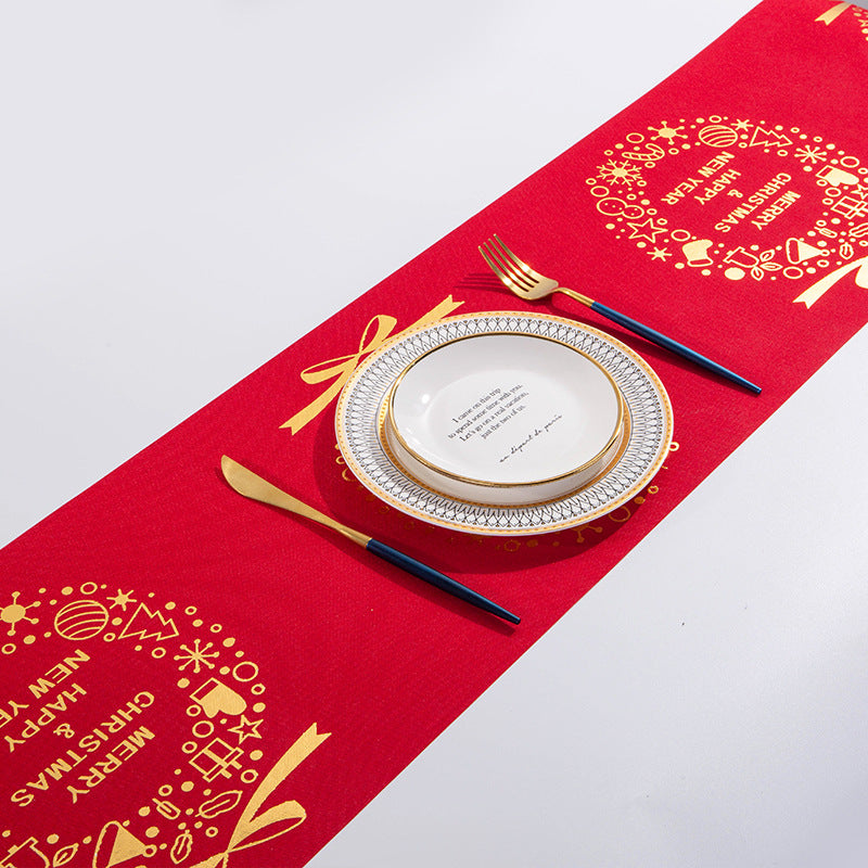 Reindeer motif set against the natural linen ground of the runner