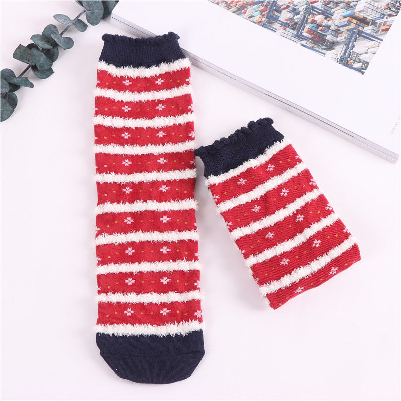Ribbed cuff at the top of the patterned Christmas sock