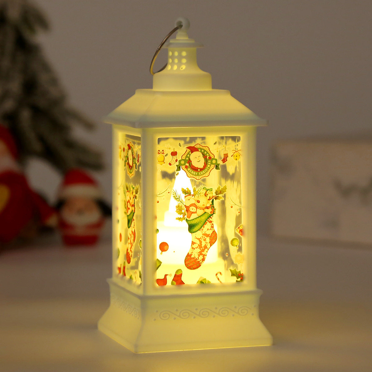 White stocking design set inside the small glass Christmas wind lamp