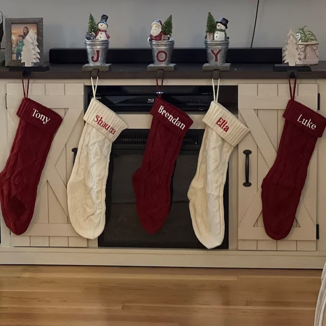 Knitted acrylic yarn forms the body of this Christmas stocking