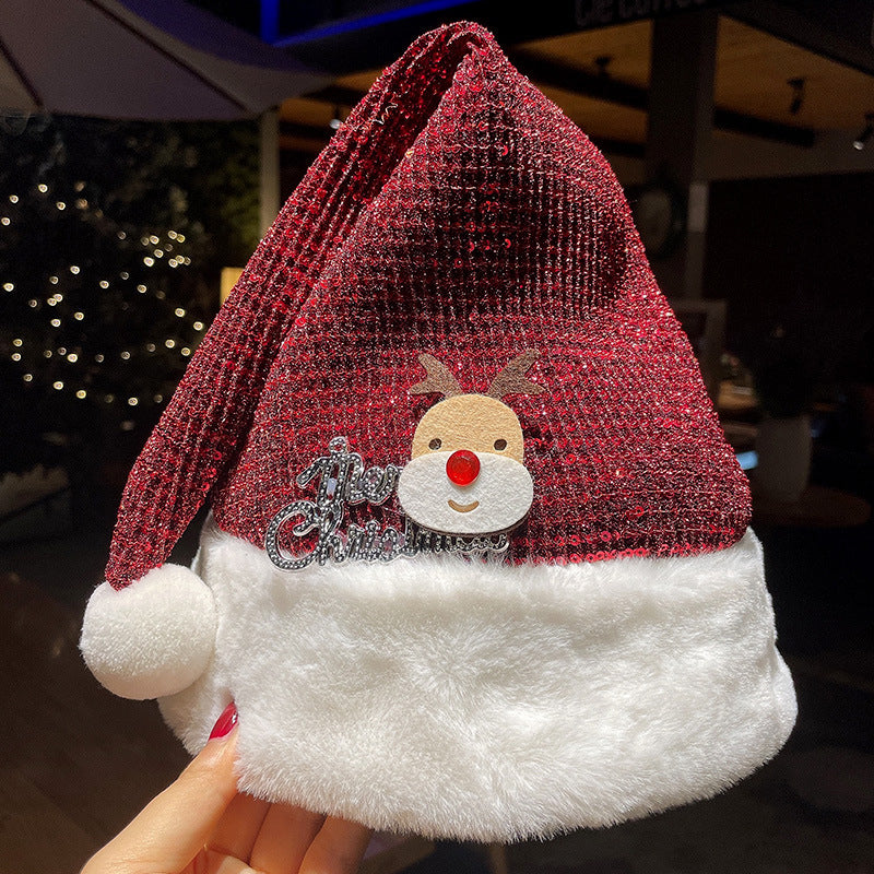 Red plush Christmas hat finished with a bow