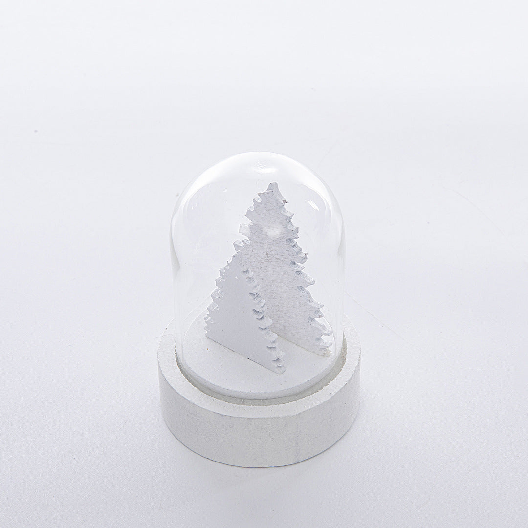 Solid wood Christmas ornament with cut window openings in the front