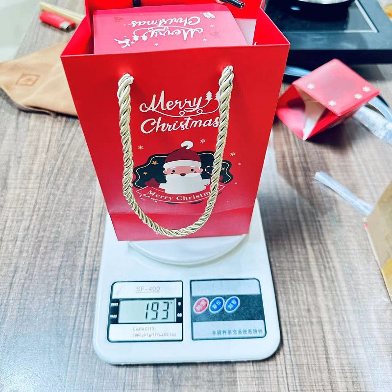 Twelve piece Christmas bounce box set with its outer gift box