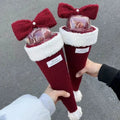 Christmas gift bouquet cone measuring 13 by 4.3 inches