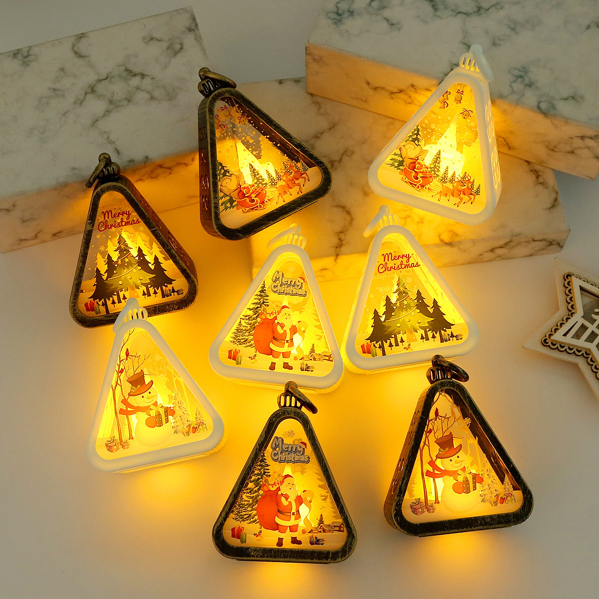 Round bronze based Christmas night light with a Santa figure